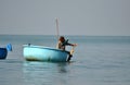 Vietnamese fisher fishing in Mui Ne, Vietnam Royalty Free Stock Photo